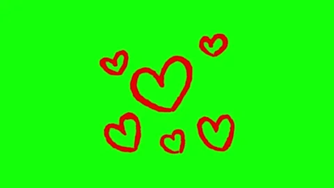 Animated red heart doodles flickering on vibrant green screen background fo.. Stock Footage 345547898