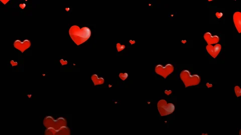 Animated red hearts soar over black background. Stock Footage 98235997