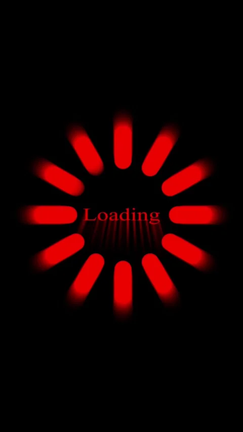 Animated red loading circle appearing on a black screen ready for website u.. Stock Footage 315637357