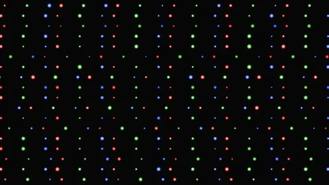 Animated RGB LED dots glowing on a dark screen background Stock Footage 346663299