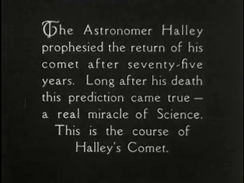 An animated sequence from the 1920s depicts the course of Halley's comet around Video stock 75283053