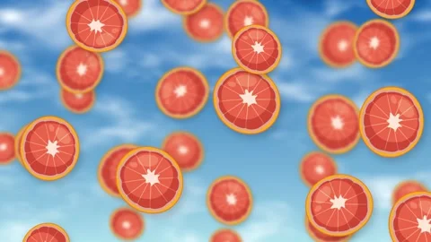 Animated Slices of Red Grapefruit Falling Against a Blue Sky Stock Footage 344519132