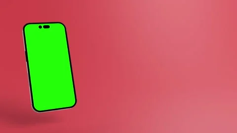 Animated smartphone with greenscreen display for apps at a red backdrop Stock Footage 255151245