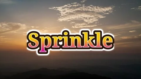 Animated sprinkle text overlay transitioning over ethereal golden hour mountain Stock-Footage 343810475