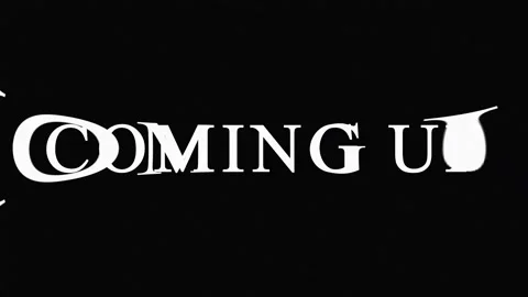 Animated text 'COMING UP' with glitch effect in cinematic motion against bl.. Stock Footage 345621123