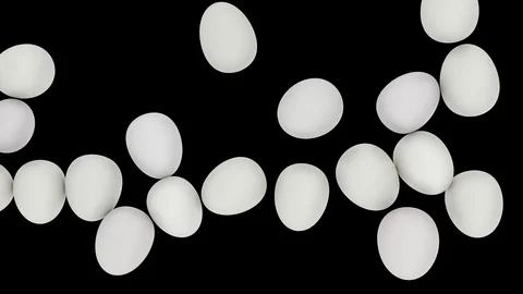 Animated top view of slowly rolling or tumbling from left to right many white eg Stock Footage 104058283