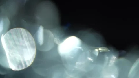 Animated transition with light leaks from bright white bokeh in the background v Stock Footage 315315885