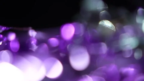 Animated transition with light leaks from bright purple bokeh in the background  Stock Footage 315316207