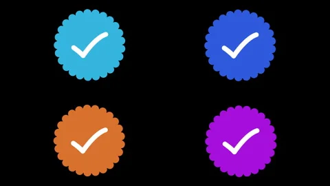 Animated verification badges in four distinct colors appearing on solid bla.. Stockbeeldmateriaal 338253311