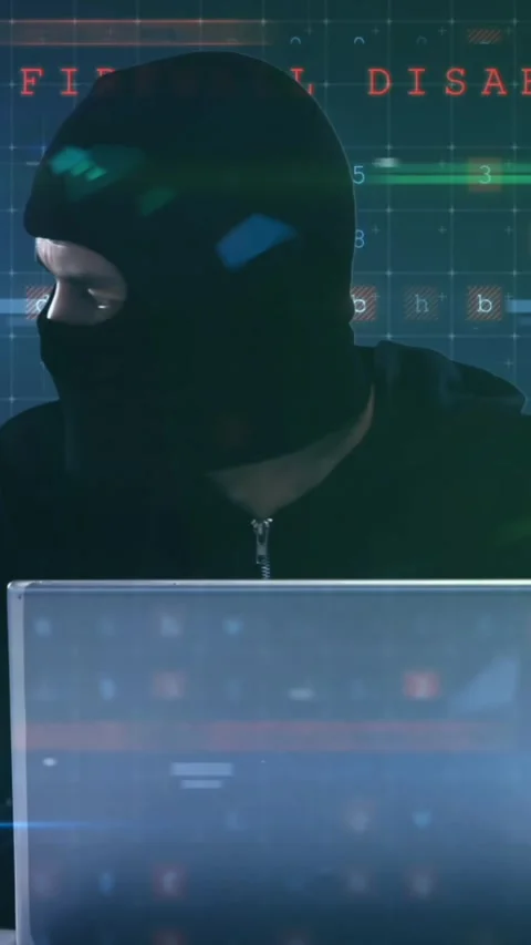 Animated video shows hacker with laptop amid colorful data webs. Stock Footage 343499006