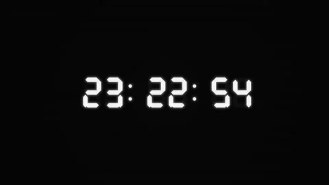 Animated white digital countdown timer from 23:00 pm to midnight Stock Footage 346000022
