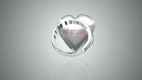 Animation 2 Wedding Rings Rotating Resting on Silver Heart 库存影片 118387370