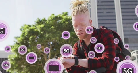 Animation of 5g texts over albino african american man scrolling on cellphone Stock Footage 325962048