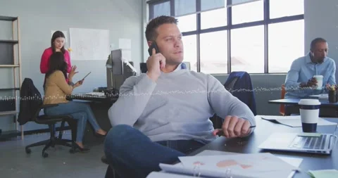 Animation of abstract pattern over caucasian businessman talking on smartphone Stock Footage 330407139