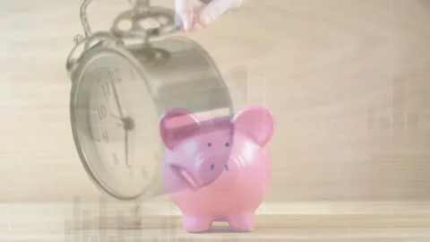 Animation of alarm clock falling on table and cropped hand of woman inserting Stock Footage 328015429
