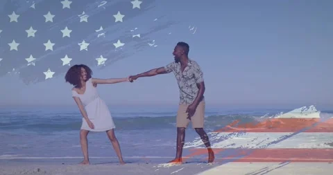 Animation of american flag design over african american couple enjoying at the Stock Footage 330105923