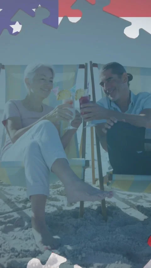 Animation of american flag jigsaw puzzles revealing senior couple with drinks in Stock Footage 341658232