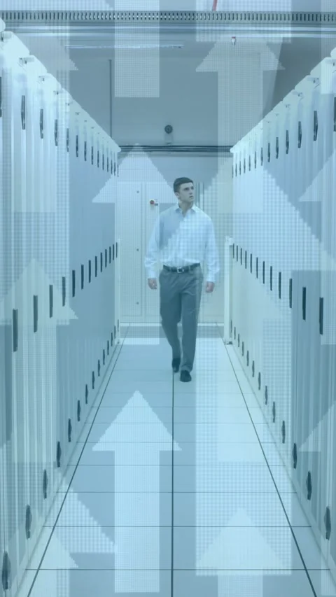 Animation of arrows pointing up with man in tech room with computer servers Stock Footage 343079504