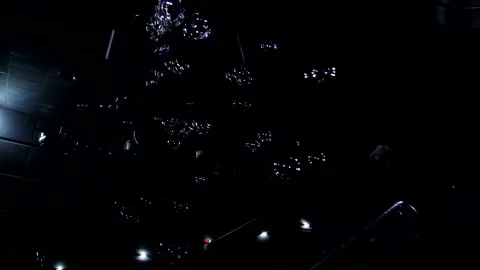 Animation autofocus close up shot of soap bubbles moving flying in air chaotical Stock Footage 138774067