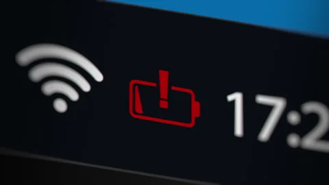 Animation of Battery Low Status on the Taskbar Stock Footage 243473489