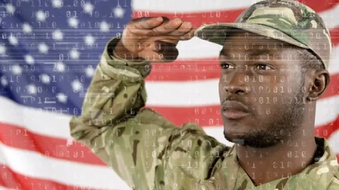 Animation of binary code and african american male soldier over flag of usa Stock Footage 329123328