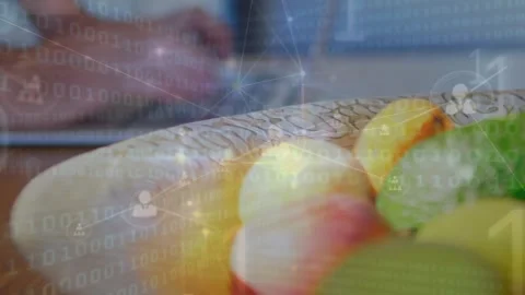 Animation on binary code and connections over fruits and hands of caucasian man Stock Footage 329288694