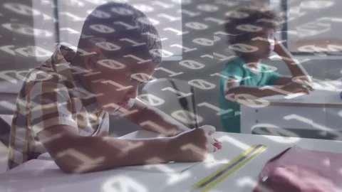 Animation of binary code over african american boy writing in book in classroom Stock Footage 328407436