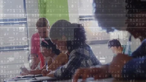 Animation of binary code over class of diverse pupils learning at school Stock Footage 329108369