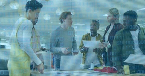 Animation of binary code over diverse coworkers talking in office Stock Footage 329844757