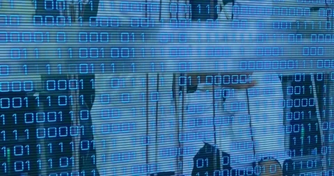 Animation of binary code over hands of lab workers Stock Footage 219974800