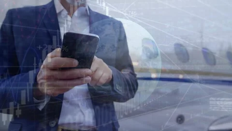Animation of binary codes, graphs, globe on businessman using cellphone against Stock Footage 329368440