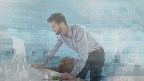 Animation of binary codes moving against caucasian businessman working on Stock Footage 203874187