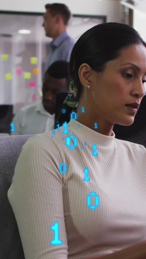 Animation of binary codes over woman scrolling on digital tablet in office Stock Footage 342612243