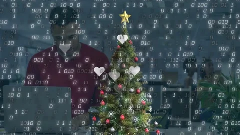 Animation of binary coding and christmas decorations over businessman in office Stock Footage 330251089
