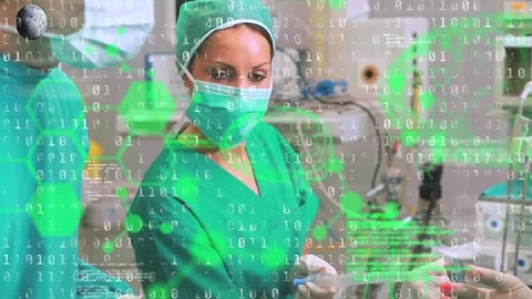 Animation of binary coding and data processing over diverse surgeons in Stock Footage 329165751