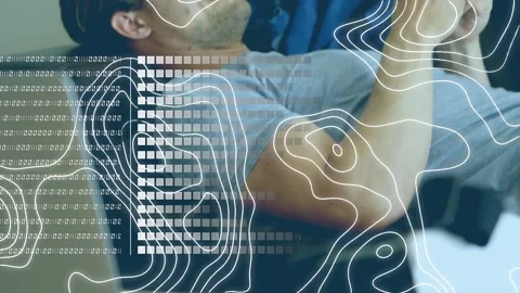 Animation of binary coding and data processing over caucasian man using Stock Footage 329695195