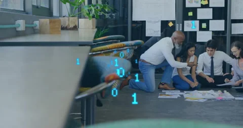 Animation of binary coding data processing over diverse business people in Stock Footage 307471062