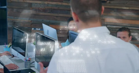 Animation of binary coding data processing over diverse business people in Stock Footage 307471268