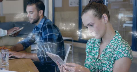 Animation of binary coding data processing over diverse business people in Stock Footage 307471369