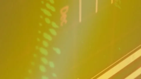 Animation of binary coding data processing over glowing computer circuit board Stock Footage 314080608