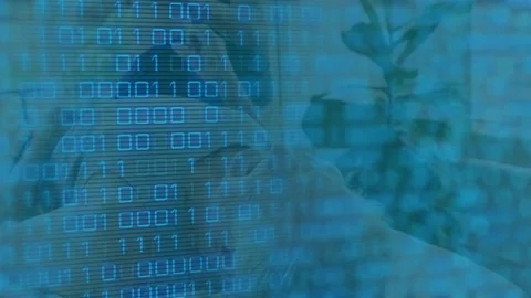 Animation of binary coding data processing over glowing computer circuit board Stock Footage 327273490