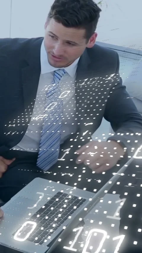Animation of binary coding data processing over diverse business people in Stock Footage 343505175