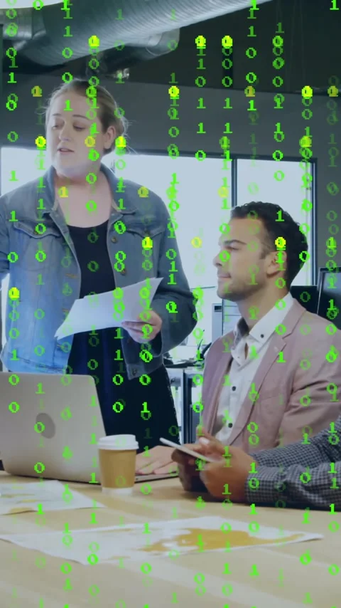 Animation of binary coding data processing over diverse business people in Stock Footage 343888355
