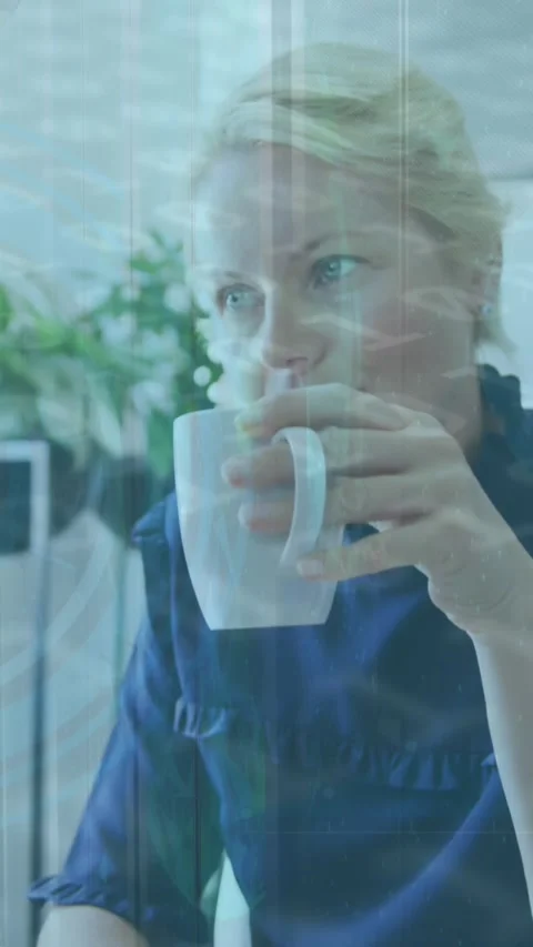 Animation of binary coding data processing over woman drinking coffee at home Vídeos de archivo 344635788