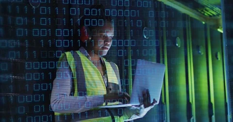 Animation of binary coding over african american male it engineer and computer Stock Footage 328969834