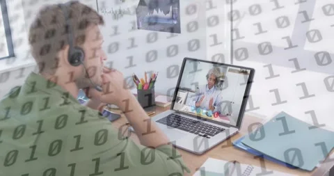 Animation of binary coding over caucasian man with headset having laptop video Stock Footage 329283388