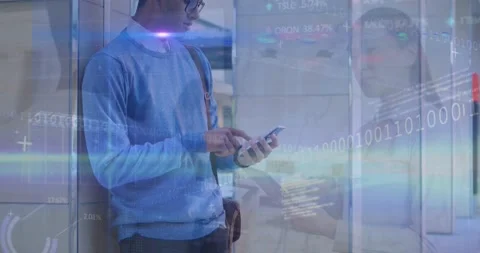 Animation of binary data, coding, flare over man using cellphone and coworkers Stock Footage 205113928