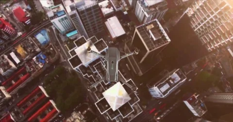Animation of black drone flighting above big city in Asia Stock Footage 69217462