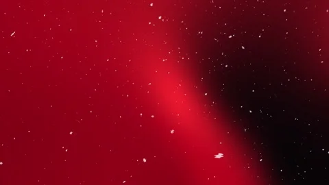 Animation Blurred red and black gradient background with scattered white specks Stock Footage 326859969