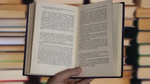 Animation of books in a hand Stock Footage 233564373
